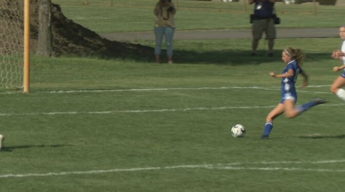 assumption soccer
